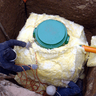 Как и чем утеплить скважину на зиму